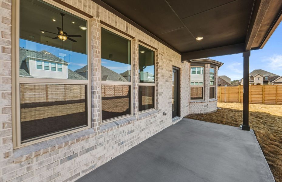 Exterior details and patio area of a home in Bluffview Reserve, Leander (Image 31).