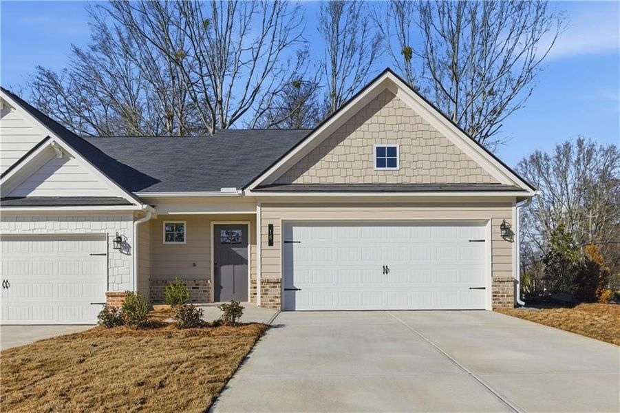 Front exterior of a new home in Silver Leaf, Dawsonville, GA, highlighting curb appeal (Image 1). Front exterior of a new home in Silver Leaf, Dawsonville, GA, highlighting curb appeal (Image 1).