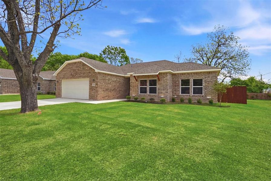 Front exterior of a new home in , Sherman, TX, highlighting curb appeal (Image 21). Front exterior of a new home in , Sherman, TX, highlighting curb appeal (Image 21).