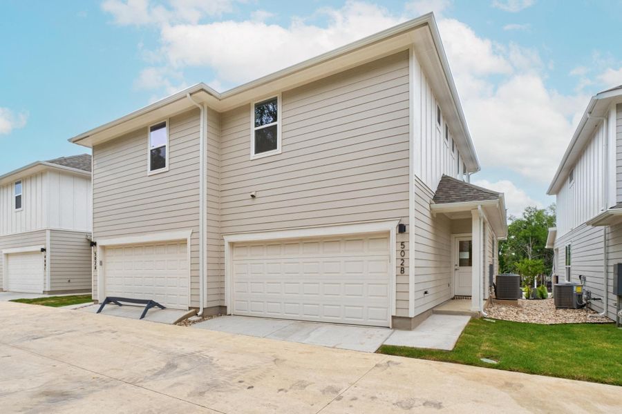 Front exterior of a new home in , Buda, TX, highlighting curb appeal (Image 20).