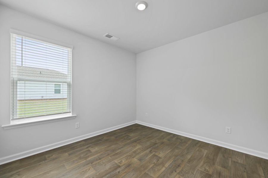 Spacious, unfurnished interior of a new home in Pine Hills at Cane Bay, Summerville (Image 11).