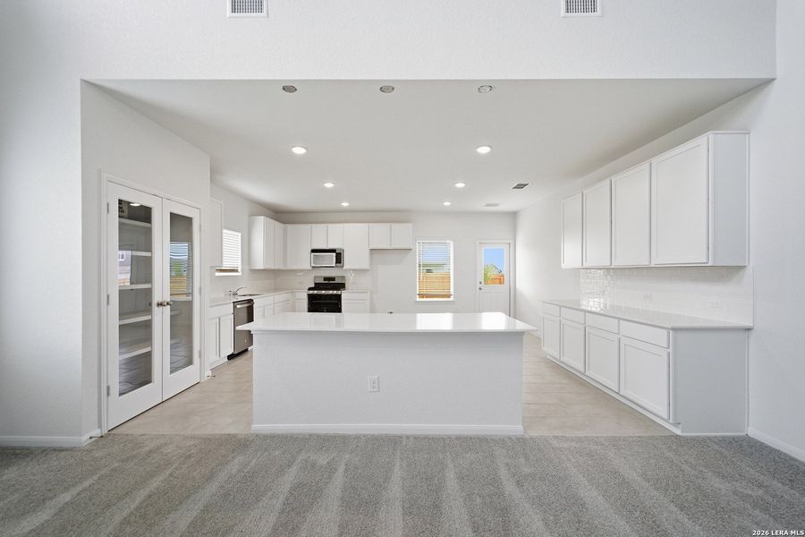 Furnished interior view inside a new home in Hennersby Hollow, San Antonio (Image 5).