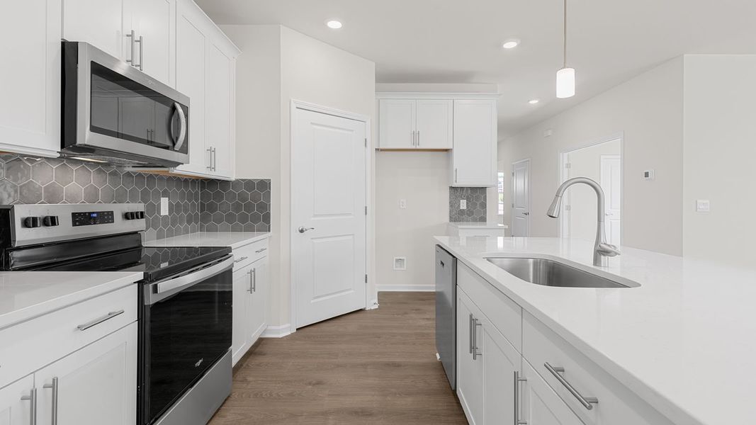 Furnished interior view inside a new home in The Villas at Kinsley, Jamestown (Image 6).