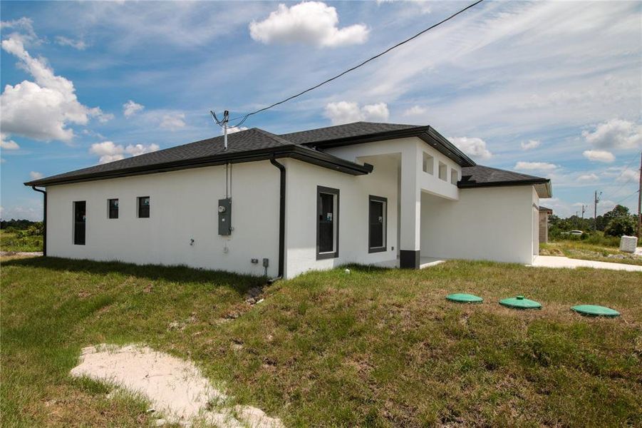 Exterior details and patio area of a home in , Lehigh Acres (Image 3).