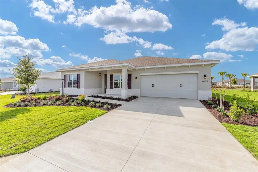 Front exterior of a new home in , Ocala, FL, highlighting curb appeal (Image 19).