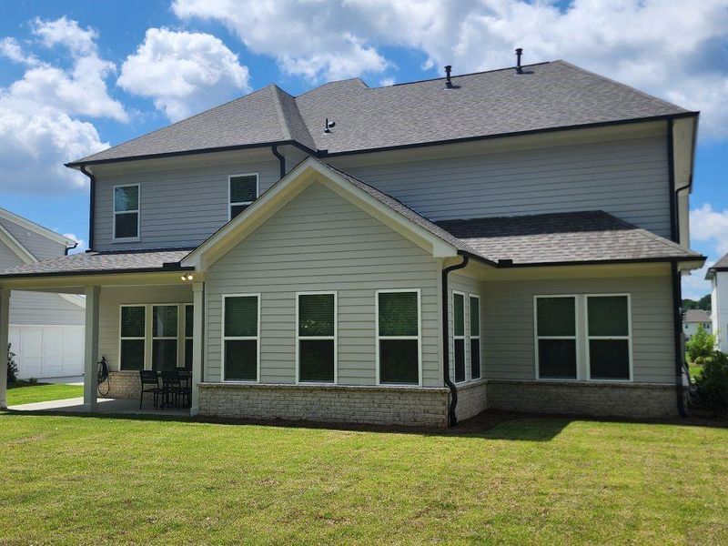 Front exterior of a new home in , Duluth, GA, highlighting curb appeal (Image 19). Front exterior of a new home in , Duluth, GA, highlighting curb appeal (Image 19).