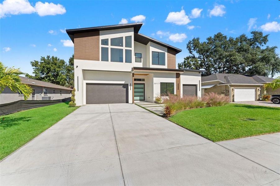 Front exterior of a new home in , Tampa, FL, highlighting curb appeal (Image 2). Front exterior of a new home in , Tampa, FL, highlighting curb appeal (Image 2).