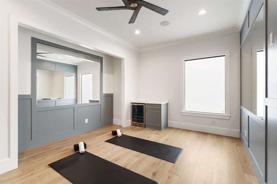 Stay fit and healthy in your own private gym, complete with mirrors, a mini fridge, and smart window technology for the perfect workout experience.