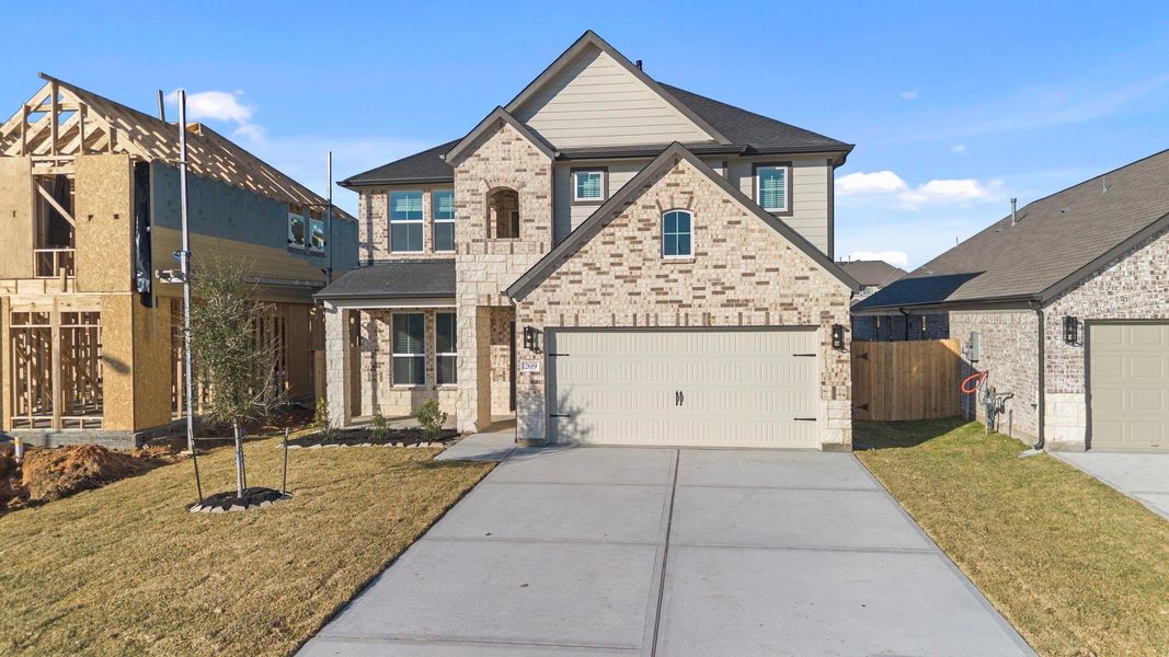 Front exterior of a new home in Morton Creek Ranch, Katy, TX, highlighting curb appeal (Image 15).