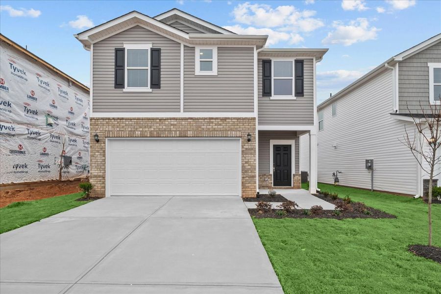 Front exterior of a new home in Village at White Pine, Pendleton, SC, highlighting curb appeal (Image 1). Front exterior of a new home in Village at White Pine, Pendleton, SC, highlighting curb appeal (Image 1).