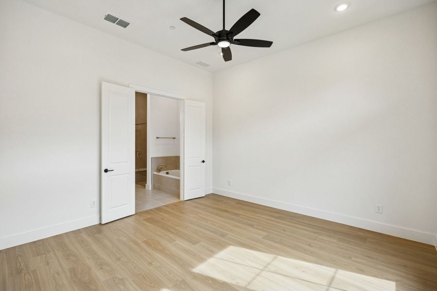 Spacious, unfurnished interior of a new home in Newman Village Townhomes, Frisco (Image 24).