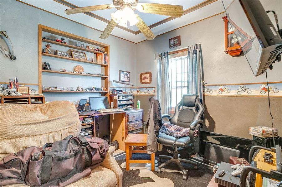 Carpeted office with ceiling fan Carpeted office with ceiling fan