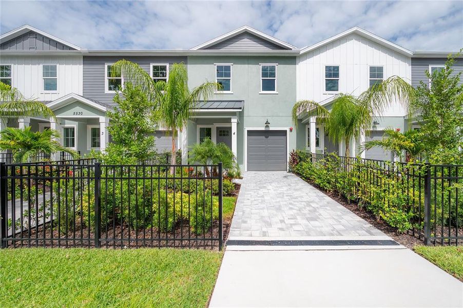Front exterior of a new home in , Tampa, FL, highlighting curb appeal (Image 1).