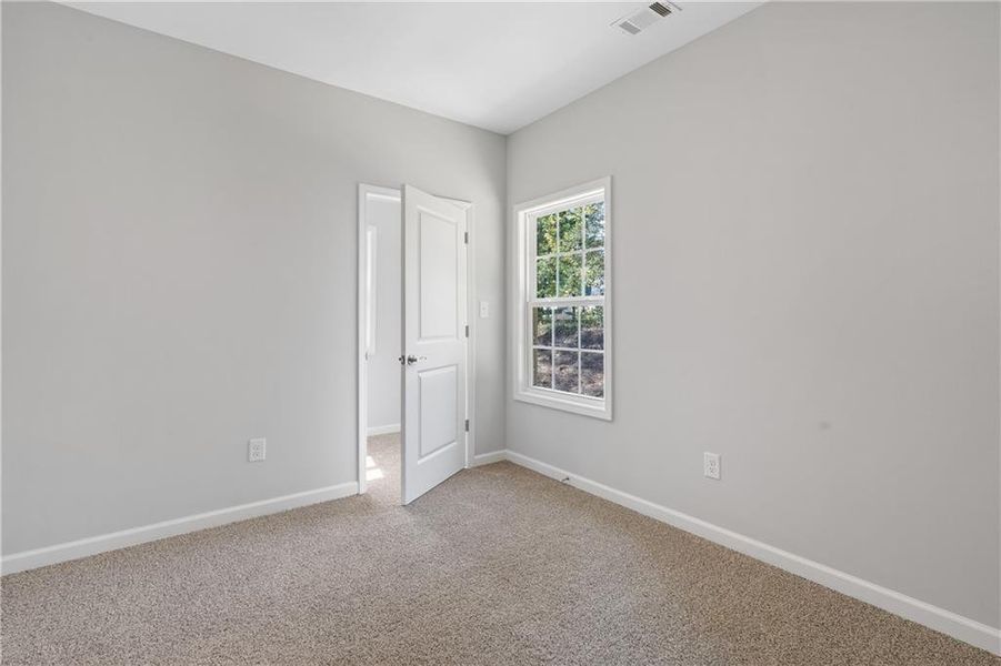 Spacious, unfurnished interior of a new home in , Gray (Image 39).