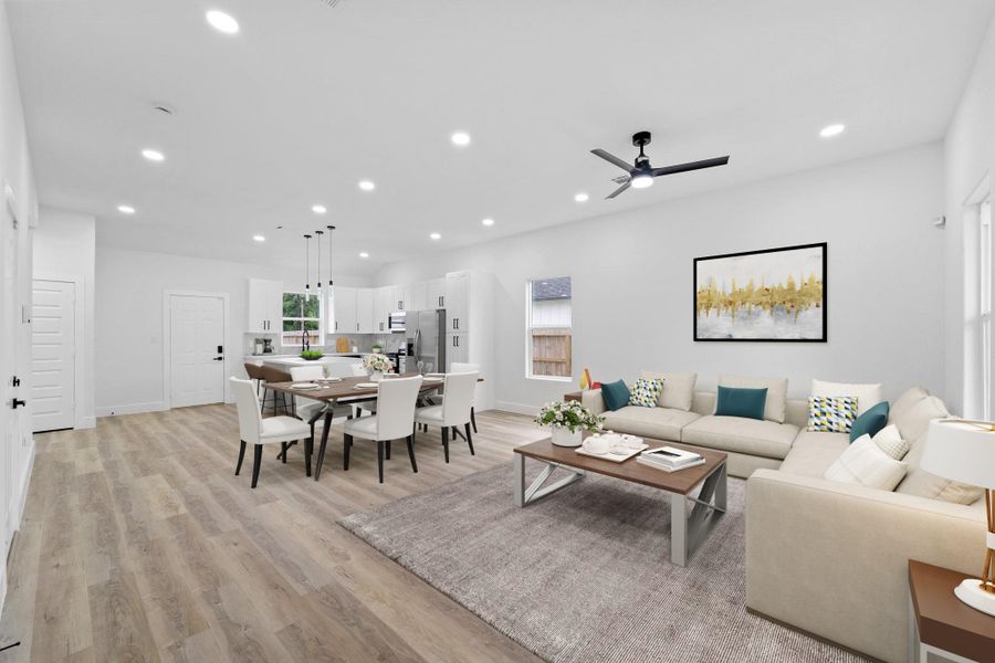 Virtually Staged: Fantastic open layout between the living, dining, and kitchen areas. An entertainer's dream!