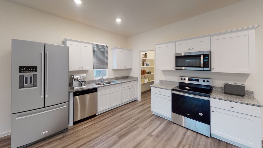 Representative furnished interior of a home built from the Polaris by Starlight Homes in Noble Ridge, Howe (Image 4).
