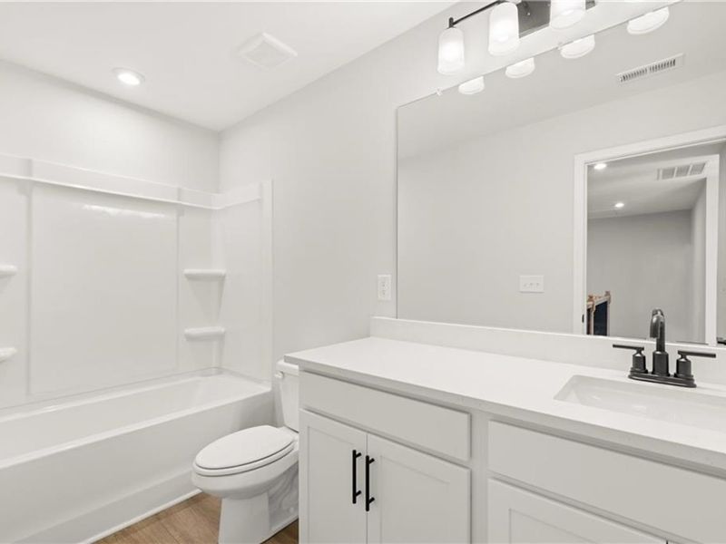 Furnished interior view inside a new home in Lake Shore, Winder (Image 9).