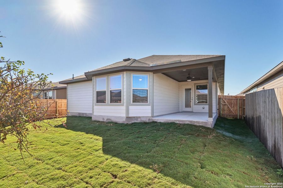Exterior details and patio area of a home in Catalina, Converse (Image 24).