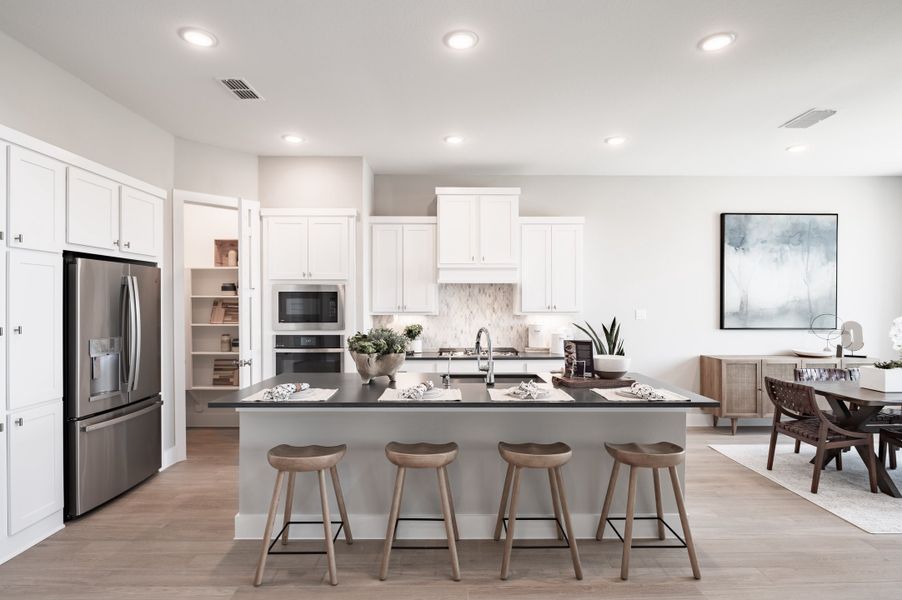 Representative furnished interior of a home built from the Verdin by Tri Pointe Homes in Pecan Ridge, Fulshear (Image 64).