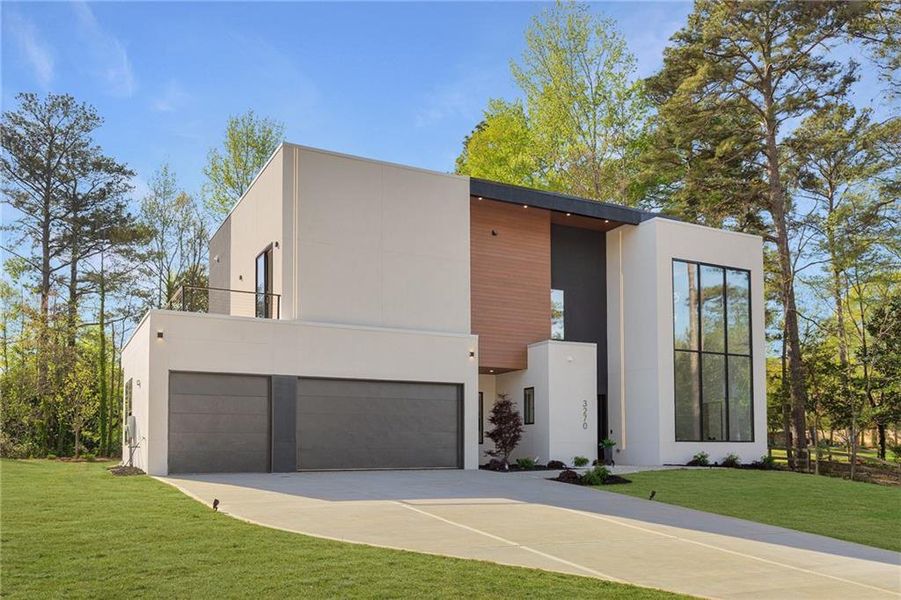 Front exterior of a new home in , Smyrna, GA, highlighting curb appeal (Image 2). Front exterior of a new home in , Smyrna, GA, highlighting curb appeal (Image 2).