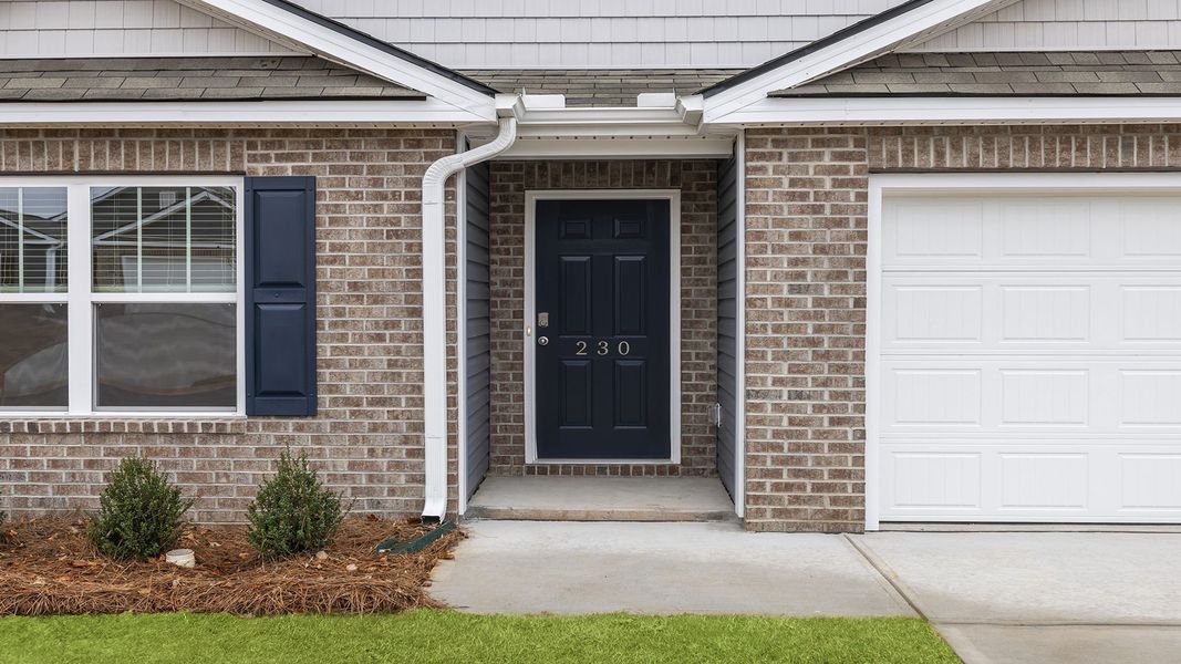Exterior details and patio area of a home in Cedar Gap, Fountain Inn (Image 2). Exterior details and patio area of a home in Cedar Gap, Fountain Inn (Image 2).