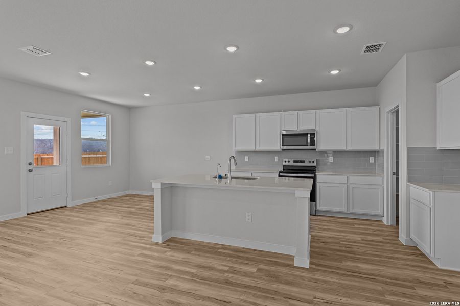 Furnished interior view inside a new home in Spring Creek, San Antonio (Image 5).