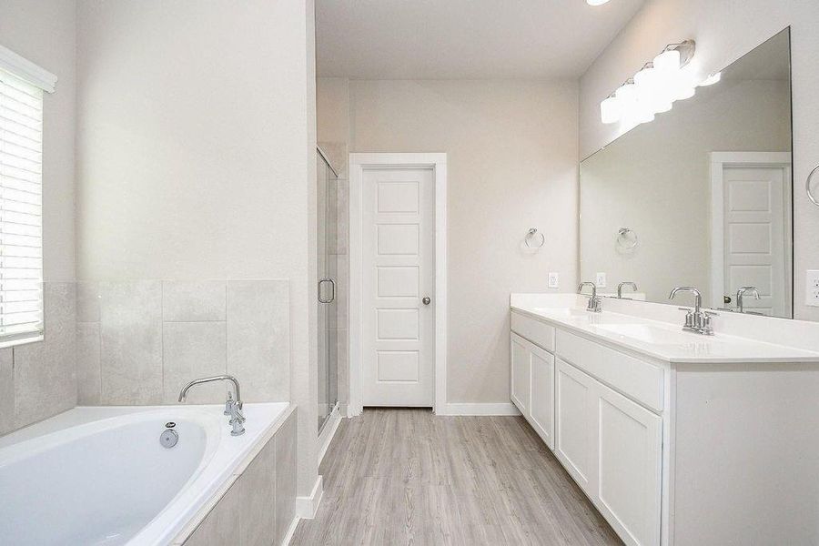 Furnished interior view inside a new home in Marvida, Cypress (Image 8).