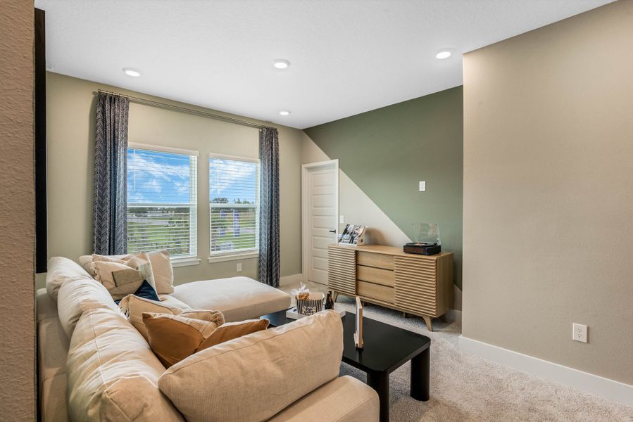 Furnished interior view inside a new home in Harvest at Ovation - Townhomes, Winter Garden (Image 30).