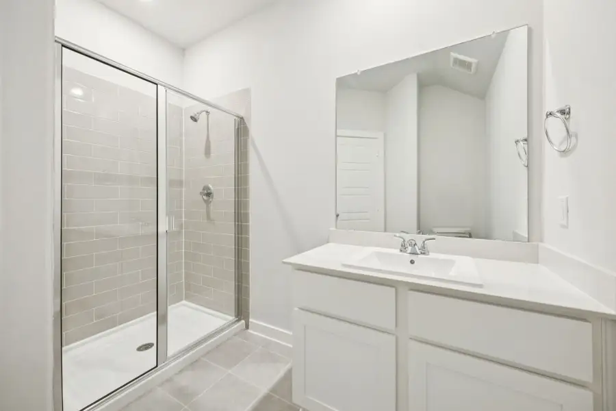 Bathroom in the Masters home plan by Trophy Signature Homes – REPRESENTATIVE PHOTO Bathroom in the Masters home plan by Trophy Signature Homes – REPRESENTATIVE PHOTO