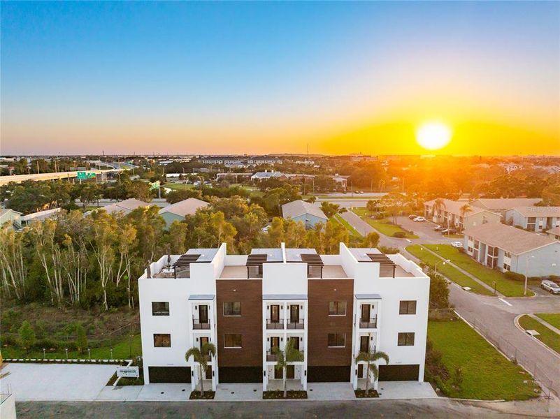 Front exterior of a new home in , St. Petersburg, FL, highlighting curb appeal (Image 1).