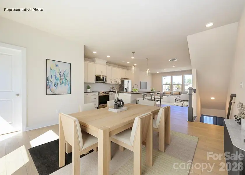 Furnished interior view inside a new home in Central Living at Craig, Charlotte (Image 3).