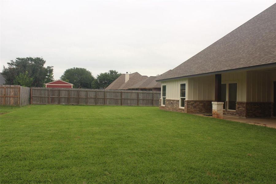 Exterior details and patio area of a home in , Clute (Image 22).