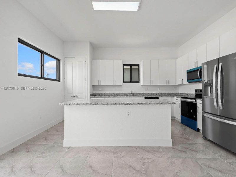 Furnished interior view inside a new home in , Homestead (Image 11). Furnished interior view inside a new home in , Homestead (Image 11).
