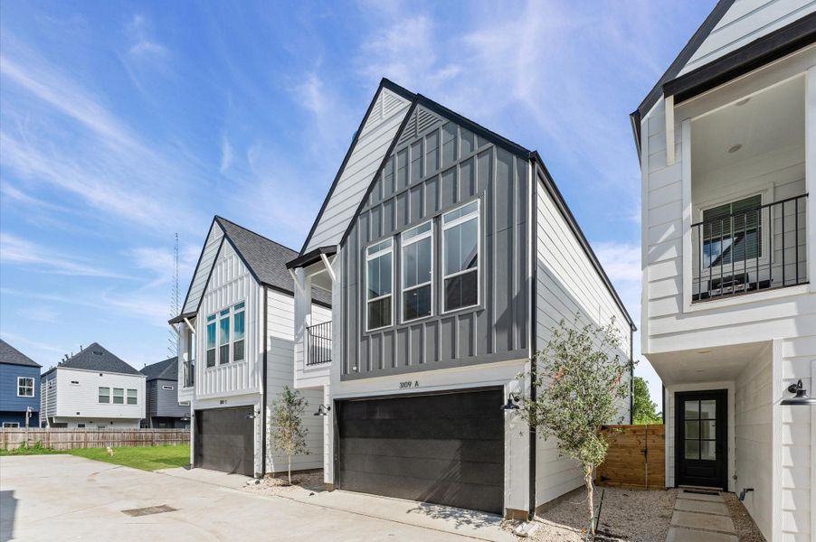 Front exterior of a new home in Jensen Villas, Houston, TX, highlighting curb appeal (Image 21). Front exterior of a new home in Jensen Villas, Houston, TX, highlighting curb appeal (Image 21).