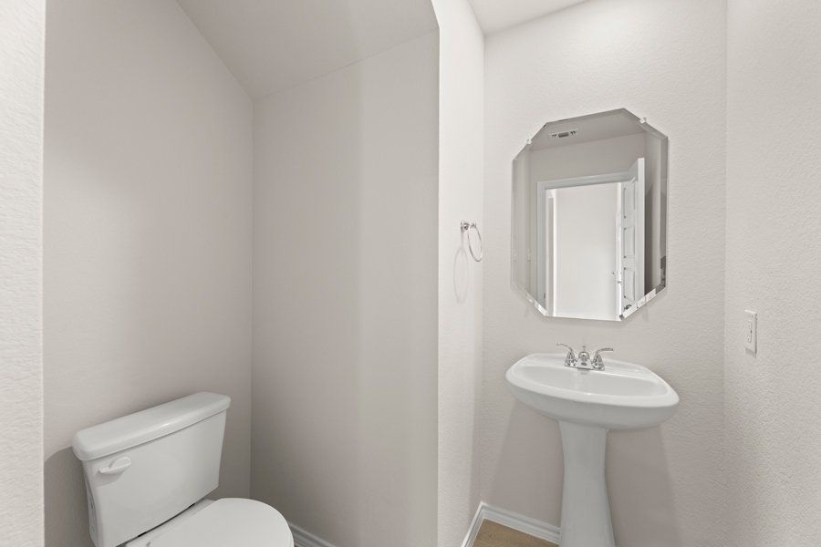 Front exterior of a new home in Sanger Circle, Sanger, TX, highlighting curb appeal (Image 16).