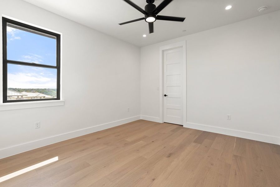 Spacious, unfurnished interior of a new home in Milky Way at River Place, Austin (Image 32).