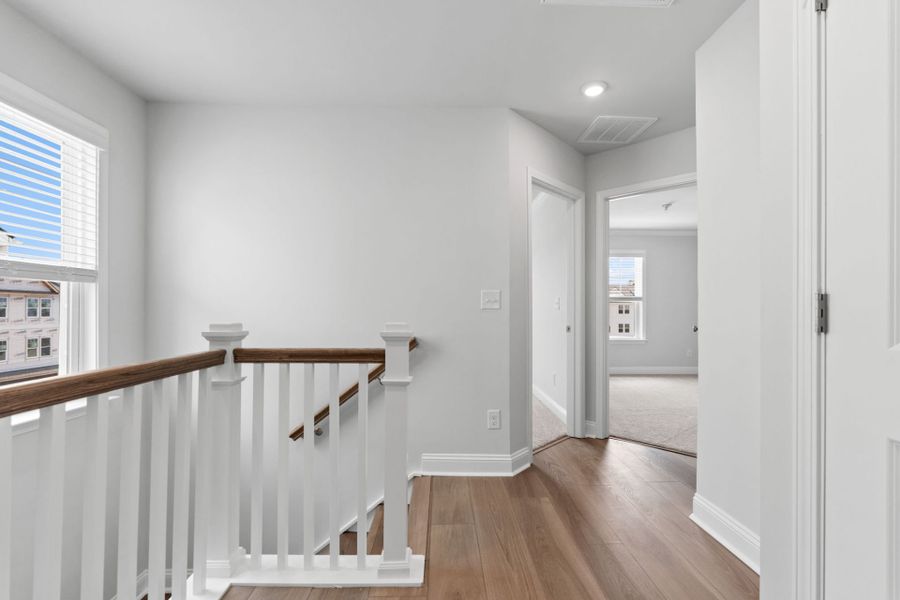 Spacious, unfurnished interior of a new home in Lakeside Townes at Riverlights, Wilmington (Image 29). Spacious, unfurnished interior of a new home in Lakeside Townes at Riverlights, Wilmington (Image 29).