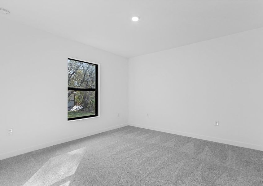 Kick your shoes off and relax in the gorgeous master bedroom