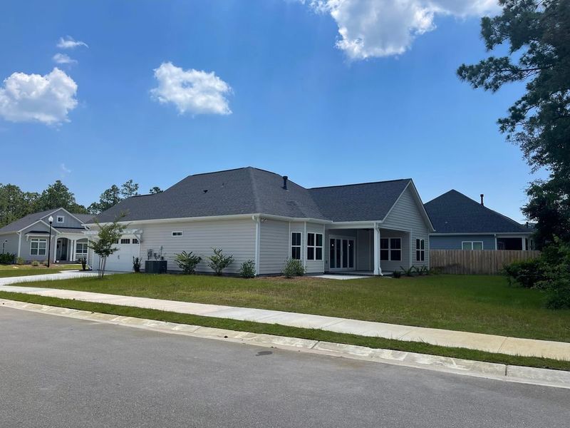 Representative exterior photo of a completed home built from the Birchwood by Bill Clark Homes in Osprey Landing, Southport, NC (Image 13). Representative exterior photo of a completed home built from the Birchwood by Bill Clark Homes in Osprey Landing, Southport, NC (Image 13).