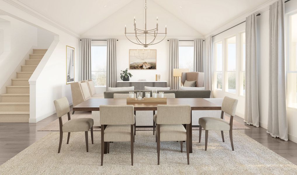 Dining area with vaulted ceiling and chandelier Dining area with vaulted ceiling and chandelier