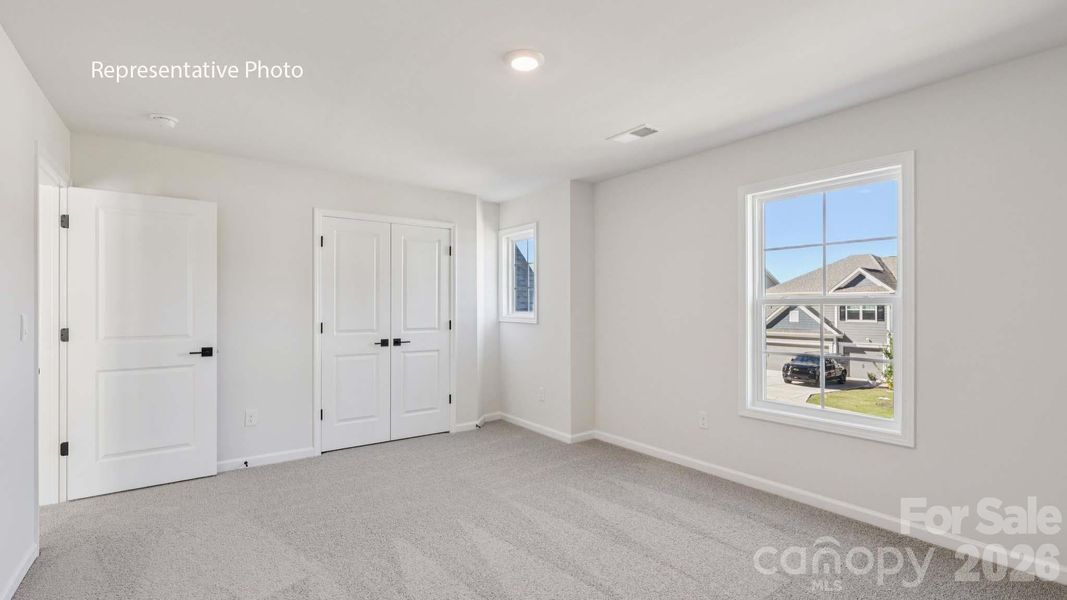 Spacious, unfurnished interior of a new home in Sanctuary at Southgate, Indian Trail (Image 25).