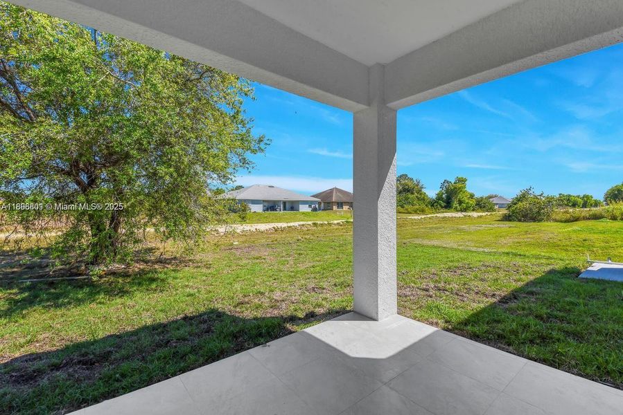 Exterior details and patio area of a home in , Lehigh Acres (Image 2).