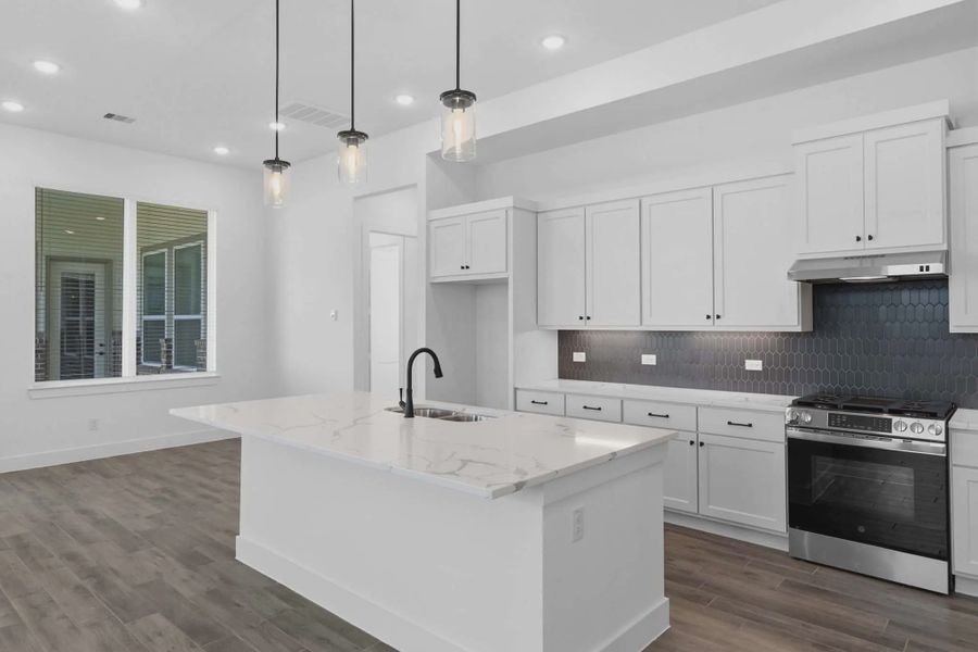 Representative furnished interior of a home built from the Sorenstam by Chesmar Homes in Riceland Alley Loads, Mont Belvieu (Image 14).