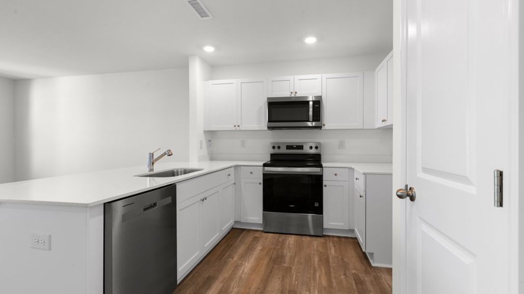 Furnished interior view inside a new home in The Townes at Belle Grove, Wendell (Image 6).
