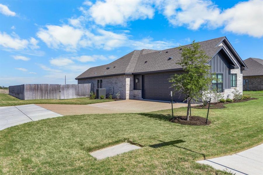 Front exterior of a new home in , Robinson, TX, highlighting curb appeal (Image 22). Front exterior of a new home in , Robinson, TX, highlighting curb appeal (Image 22).