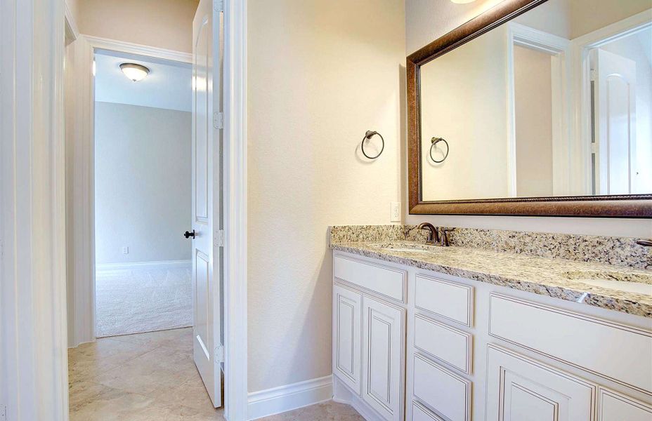 Representative furnished interior of a home built from the 3710 by Ravenna Homes in Artavia 70′, Conroe (Image 12).