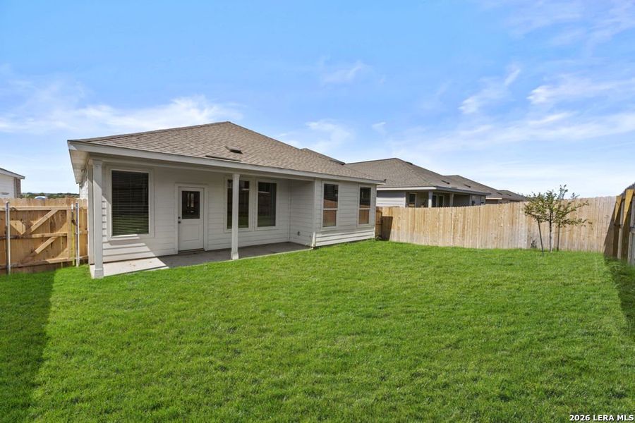 Exterior details and patio area of a home in Sky Ranch, New Braunfels (Image 2).