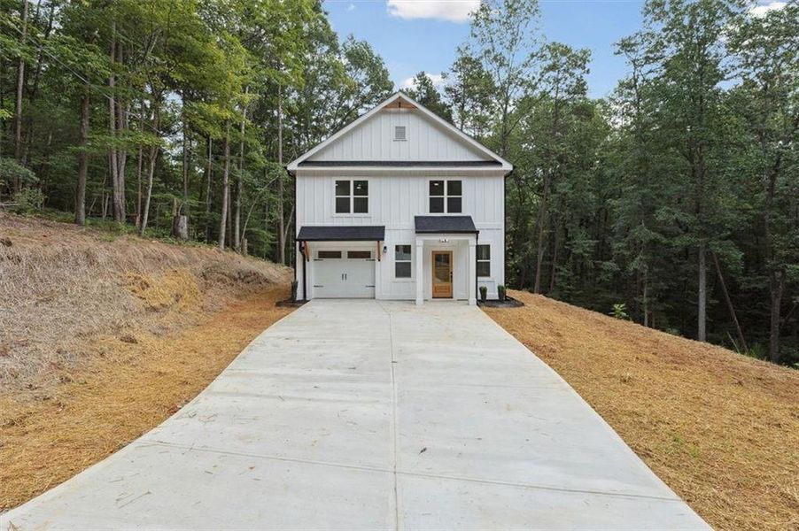 Front exterior of a new home in , Gainesville, GA, highlighting curb appeal (Image 16).