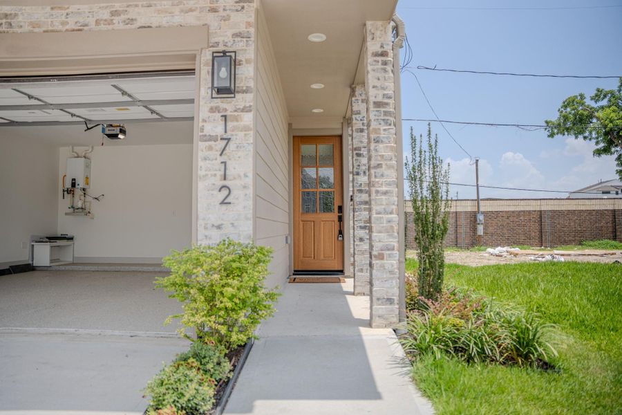 Exterior details and patio area of a home in Spring Valley Creek, Houston (Image 27).