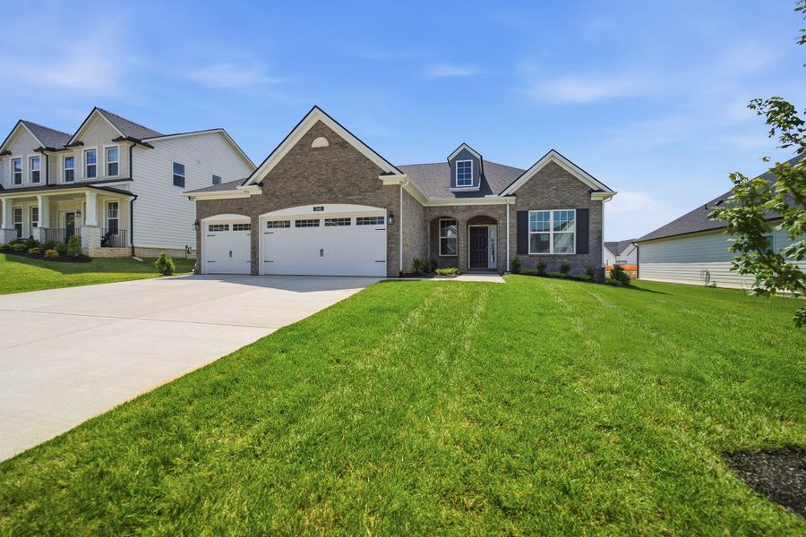 Front exterior of a new home in Dorris Farm, White House, TN, highlighting curb appeal (Image 2).